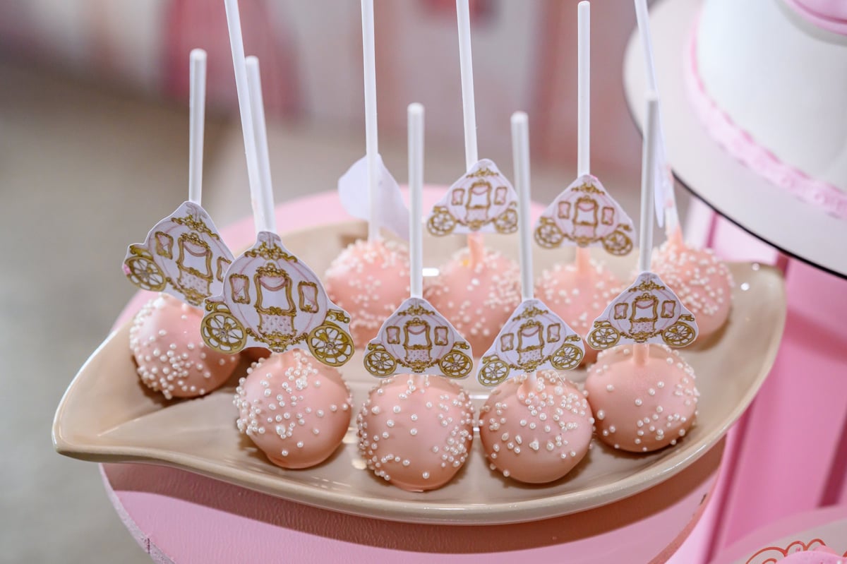 Pink cake pops on platter